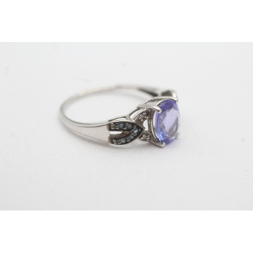 132 - 9ct gold tanzanite & diamond dress ring (2.5g) Size R 1/2