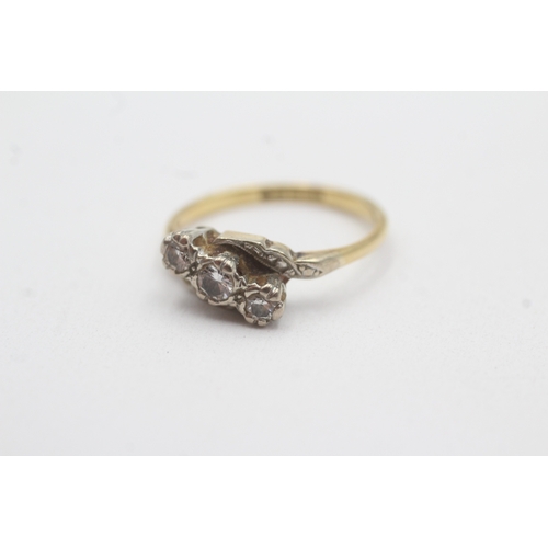 137 - 18ct gold diamond trilogy crossover ring (3g) Size L 1/2