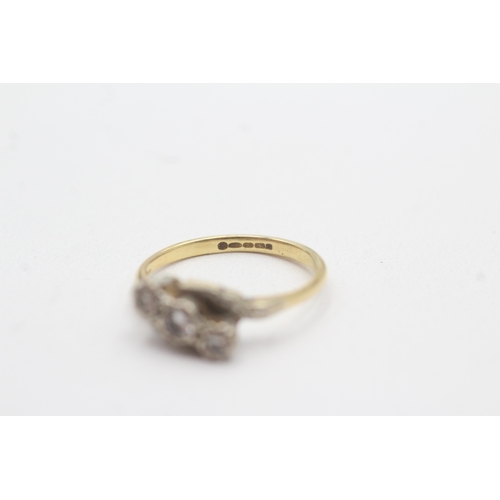137 - 18ct gold diamond trilogy crossover ring (3g) Size L 1/2