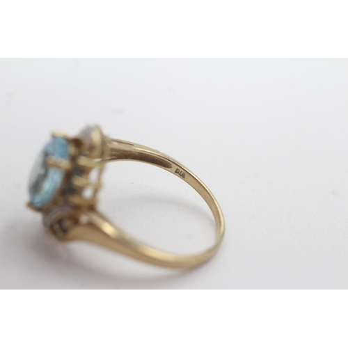 155 - 9ct gold topaz diamond cluster bypass ring (4.1g) Size P
