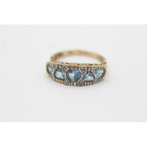 159 - 9ct gold blue topaz diamond heart ring (2.4g) Size K 1/2
