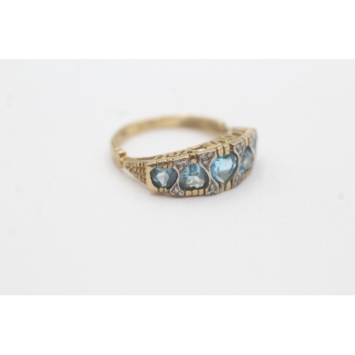 159 - 9ct gold blue topaz diamond heart ring (2.4g) Size K 1/2