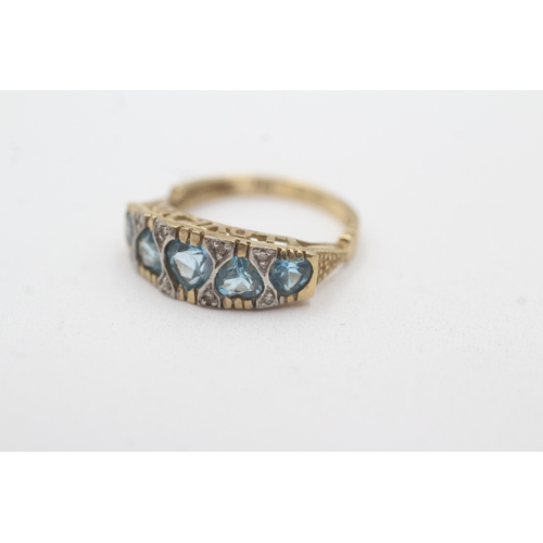 159 - 9ct gold blue topaz diamond heart ring (2.4g) Size K 1/2