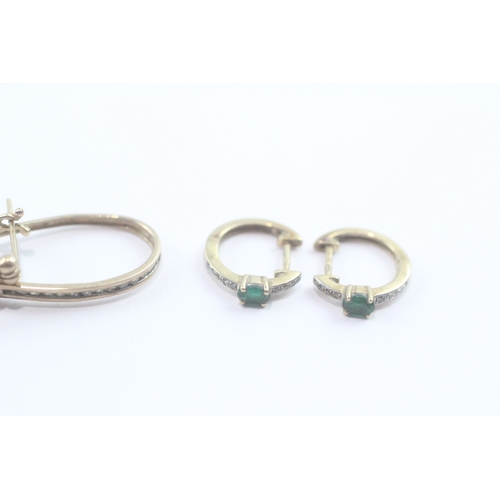 46 - 2 x 9ct gold stone set hoop earrings inc. diamond and emerald (3.5g)
