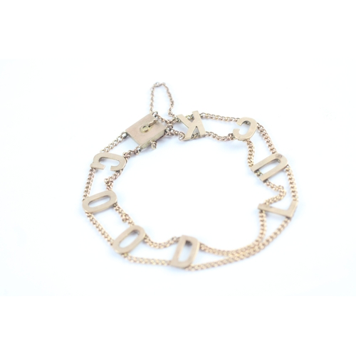 56 - 9ct gold antique 'GOODLUCK' bracelet (7.1g)