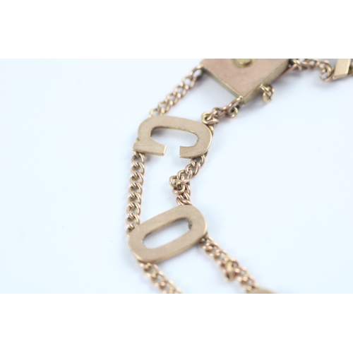 56 - 9ct gold antique 'GOODLUCK' bracelet (7.1g)