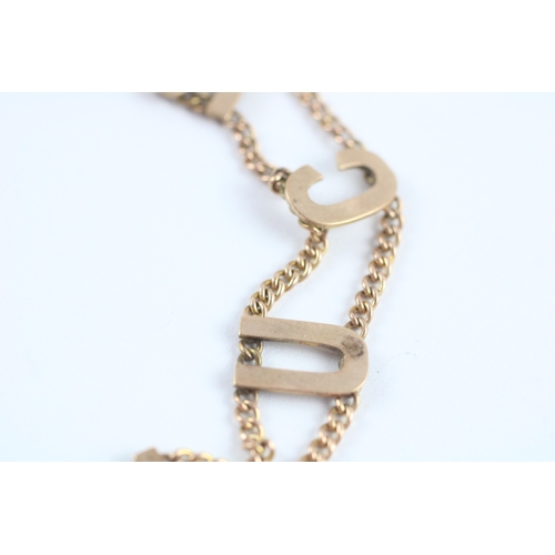 56 - 9ct gold antique 'GOODLUCK' bracelet (7.1g)