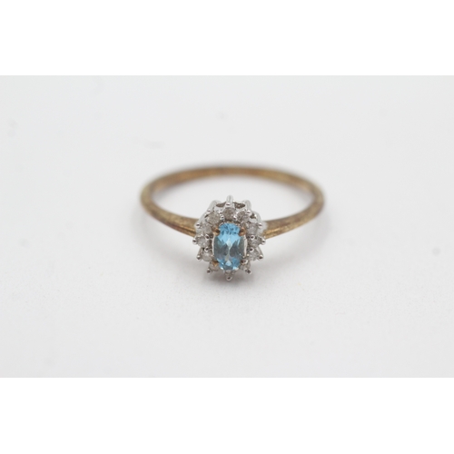 59 - 9ct gold diamond blue topaz cluster ring (1.7g) Size N