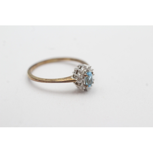 59 - 9ct gold diamond blue topaz cluster ring (1.7g) Size N
