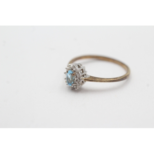 59 - 9ct gold diamond blue topaz cluster ring (1.7g) Size N