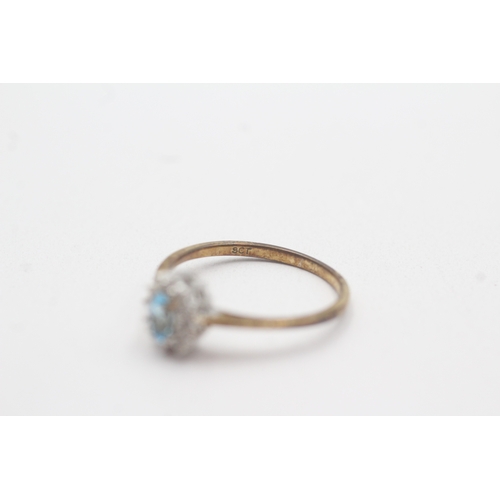 59 - 9ct gold diamond blue topaz cluster ring (1.7g) Size N