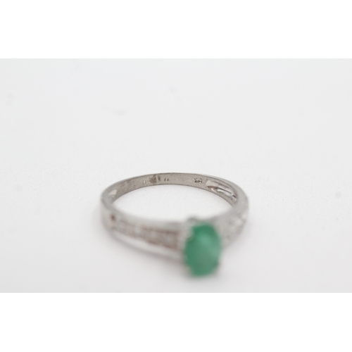 67 - 9ct white gold emerald diamond dress ring (2g) Size M