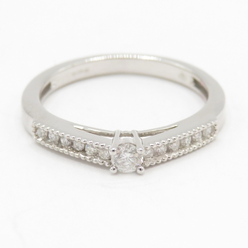 64 - 9ct gold diamond ring (2.5g) Size N