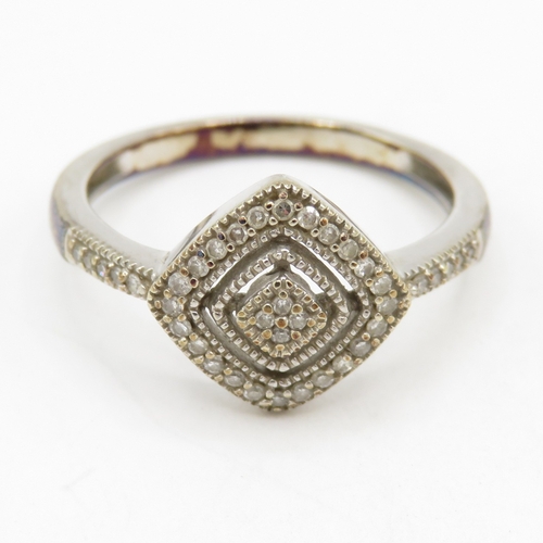 92 - 9ct white gold diamond dress ring (2.7g) Size L