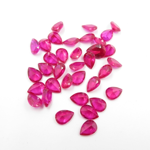 240 - Collection of Gemstones inc. Ruby, Synthetic Ruby, Garnet 142g (weight including bags)