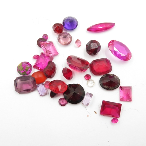 240 - Collection of Gemstones inc. Ruby, Synthetic Ruby, Garnet 142g (weight including bags)