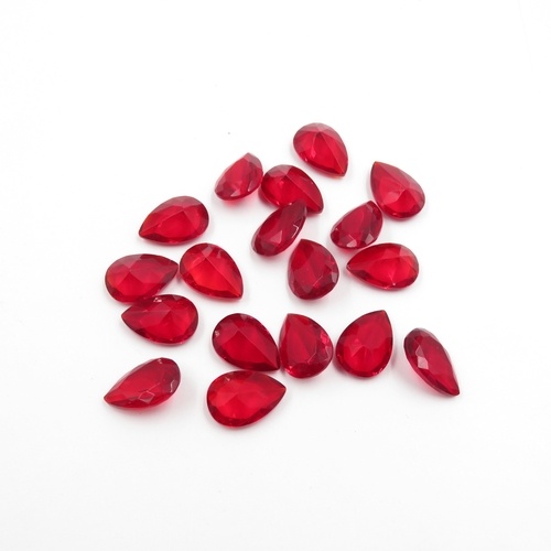 240 - Collection of Gemstones inc. Ruby, Synthetic Ruby, Garnet 142g (weight including bags)