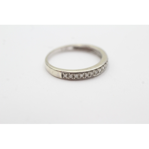 104 - 9ct white gold diamond half eternity ring (1.8g) Size O