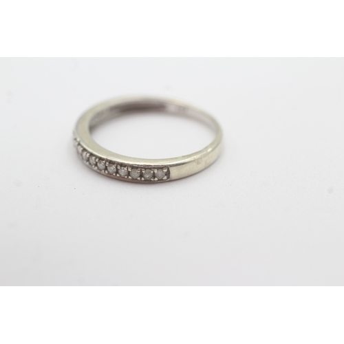 104 - 9ct white gold diamond half eternity ring (1.8g) Size O