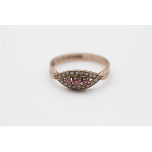 107 - 9ct gold red paste and split pearl ring (1.6g) Size O