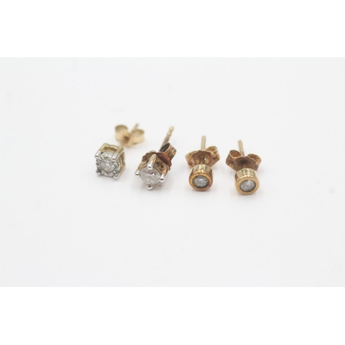 108 - 2 x 9ct gold diamond stud earrings (1.5g)