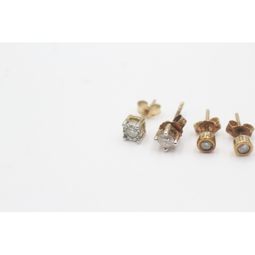 108 - 2 x 9ct gold diamond stud earrings (1.5g)