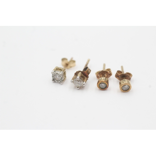 108 - 2 x 9ct gold diamond stud earrings (1.5g)