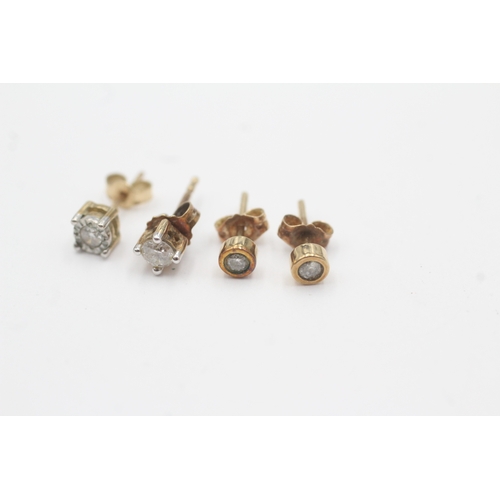 108 - 2 x 9ct gold diamond stud earrings (1.5g)