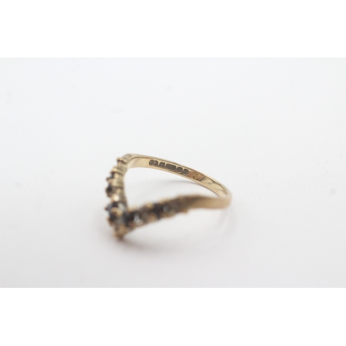 109 - 9ct gold sapphire diamond wishbone ring (2.1g) Size M