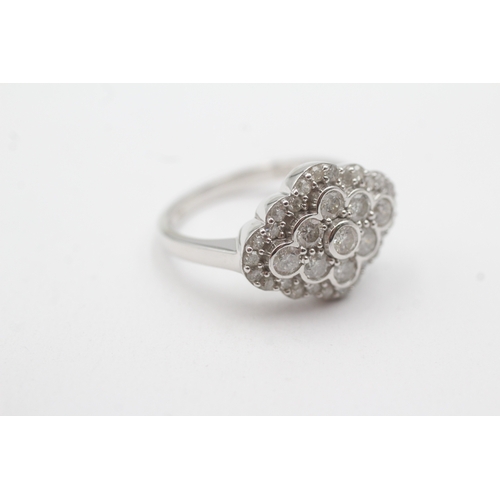 118 - 9ct white gold diamond cluster ring (4.6g) Size Q