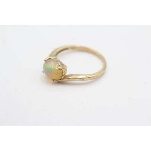 119 - 9ct gold opal and diamond dress ring (1.9g) Size L