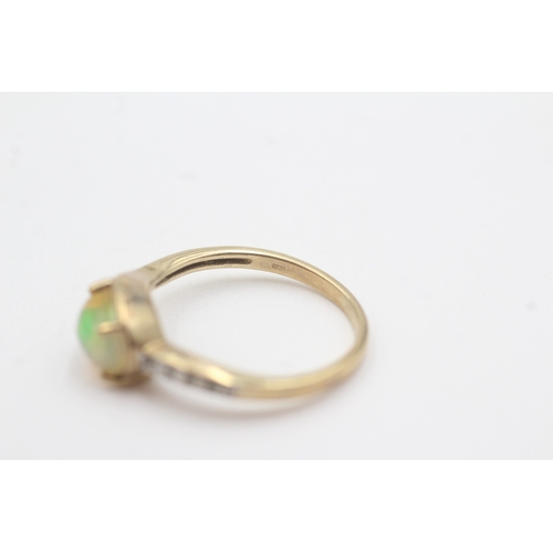 119 - 9ct gold opal and diamond dress ring (1.9g) Size L