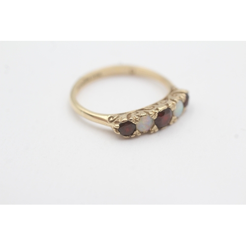 120 - 9ct gold garnet and opal five stone ring (2.4g) Size P 1/2