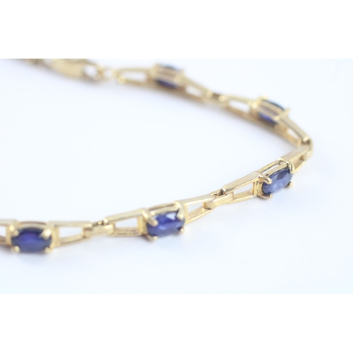 122 - 9ct gold sapphire link bracelet (5.1g)