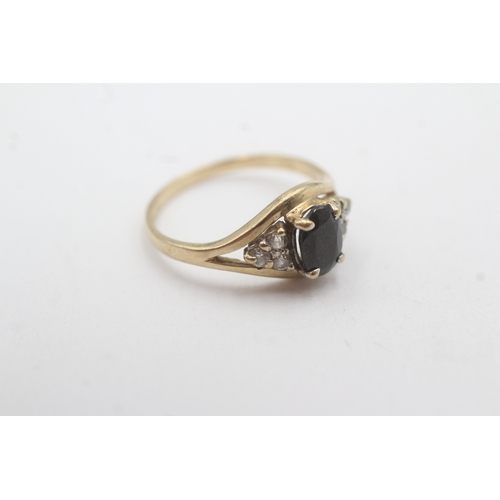 123 - 9ct gold diamond and sapphire dress ring (1.9g) Size L