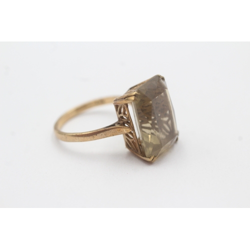139 - 9ct gold smoky quartz cocktail ring (4.8g) Size O