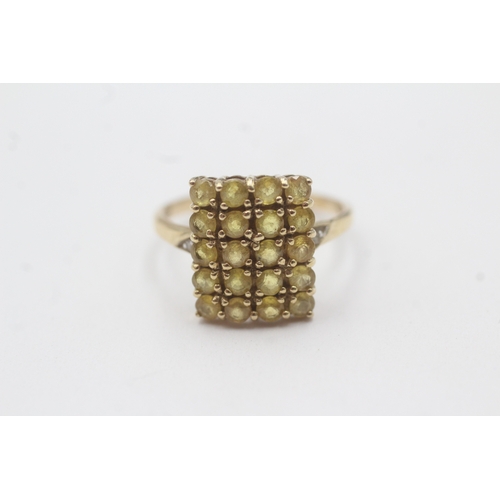 142 - 9ct gold colour enhanced yellow sapphire diamond ring (2.6g) Size N