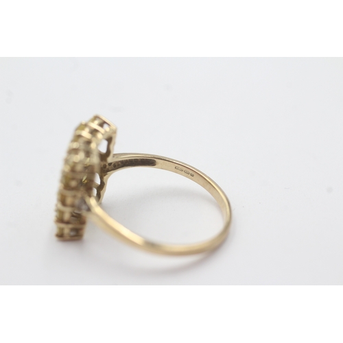 142 - 9ct gold colour enhanced yellow sapphire diamond ring (2.6g) Size N