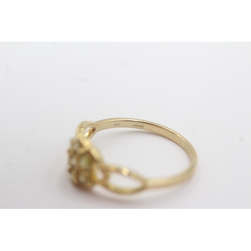 61 - 9ct gold enhanced yellow diamond cluster ring (2.6g) Size S