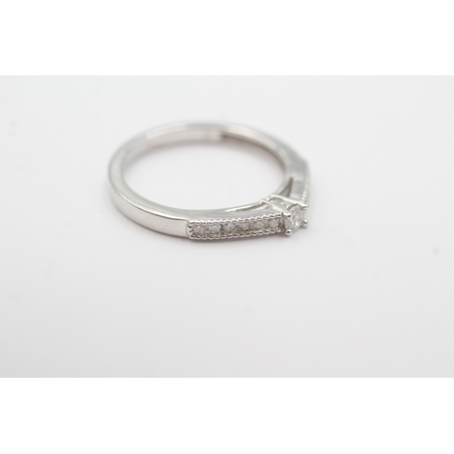 64 - 9ct gold diamond ring (2.5g) Size N