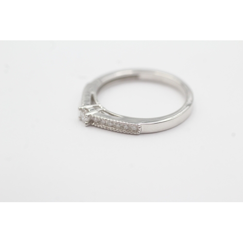 64 - 9ct gold diamond ring (2.5g) Size N