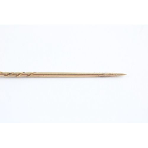 65 - 18ct gold moonstone ruby diamond stick pin (1.5g)