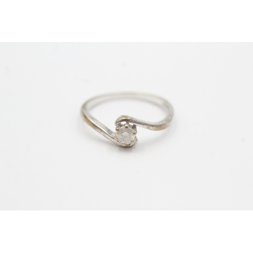 70 - 9ct gold diamond solitaire ring (1.9g) Size O