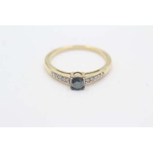 73 - 9ct gold enhanced blue diamond & diamond ring (2.5g) Size R 1/2