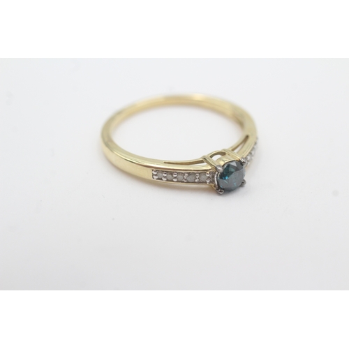 73 - 9ct gold enhanced blue diamond & diamond ring (2.5g) Size R 1/2