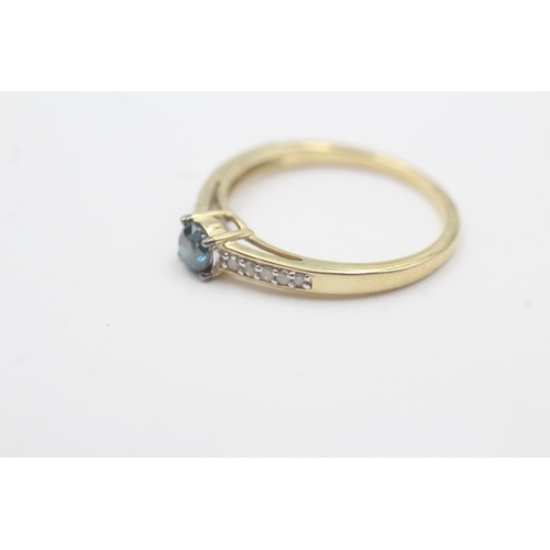 73 - 9ct gold enhanced blue diamond & diamond ring (2.5g) Size R 1/2