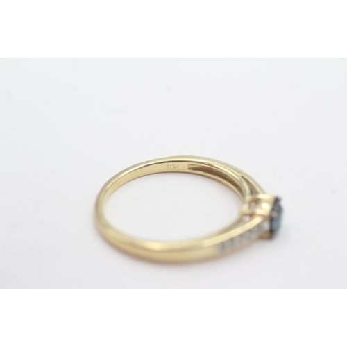 73 - 9ct gold enhanced blue diamond & diamond ring (2.5g) Size R 1/2