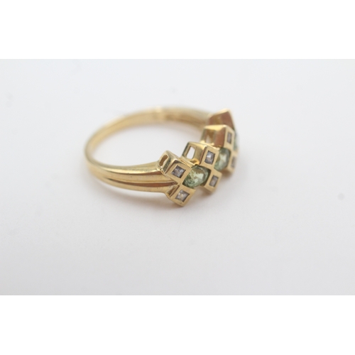 83 - 9ct gold peridot & diamond dress ring (2.8g) Size M