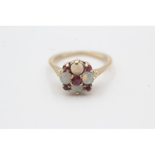 86 - 9ct gold opal and ruby cluster ring (2.7g) Size M