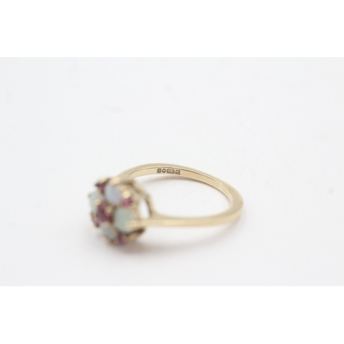 86 - 9ct gold opal and ruby cluster ring (2.7g) Size M